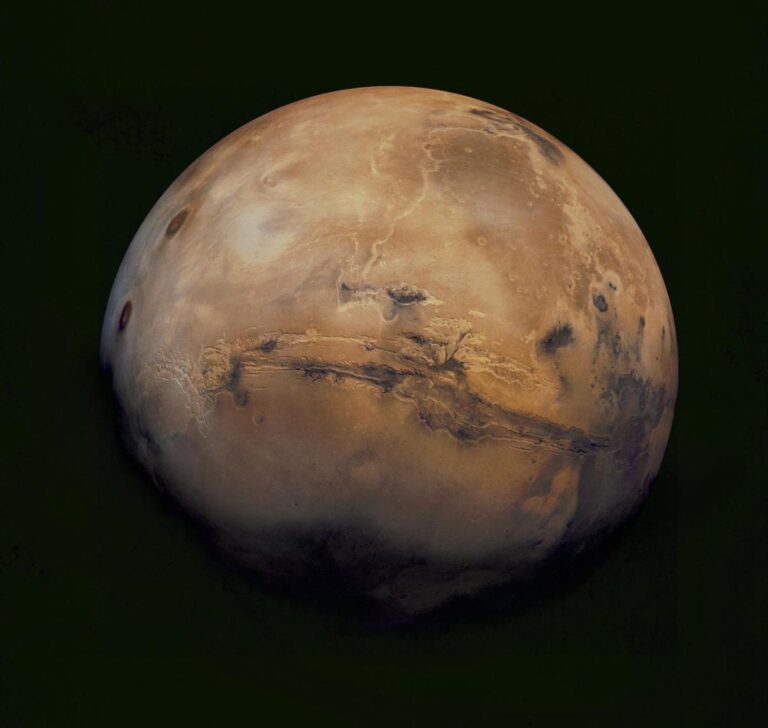 This_mosaic_is_made_up_of_more_than_100_images_captured_by_NASAs_Viking_1_orbiter_which_operated_around_Mars_from_1976_to_1980._The_scar_across_the_center_of_the_planet_is_the_vast_Valles_Marineris.jpg