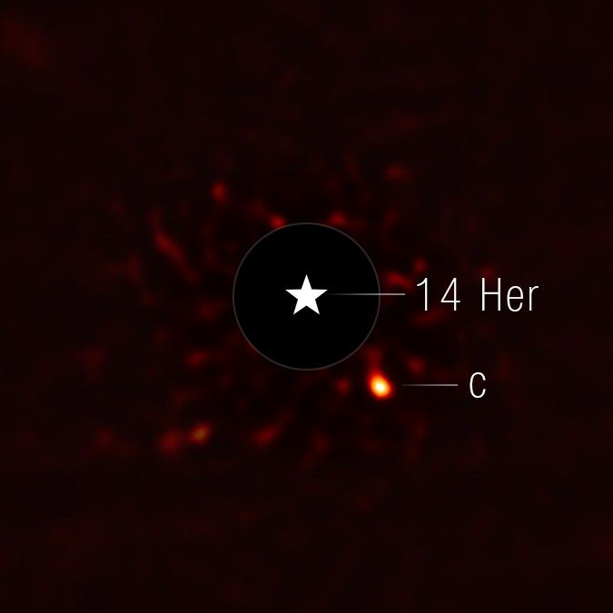 This image of exoplanet 14 Herculis c was taken by NASA’s James Webb Space Telescope’s NIRCam (Near-Infrared Camera). A star symbol marks the location of the host star 14 Herculis, whose light has been blocked by a coronagraph on NIRCam (shown here as a dark circle outlined in white). Credits: NASA, ESA, CSA, STScI, W. Balmer (JHU), D. Bardalez Gagliuffi (Amherst College)