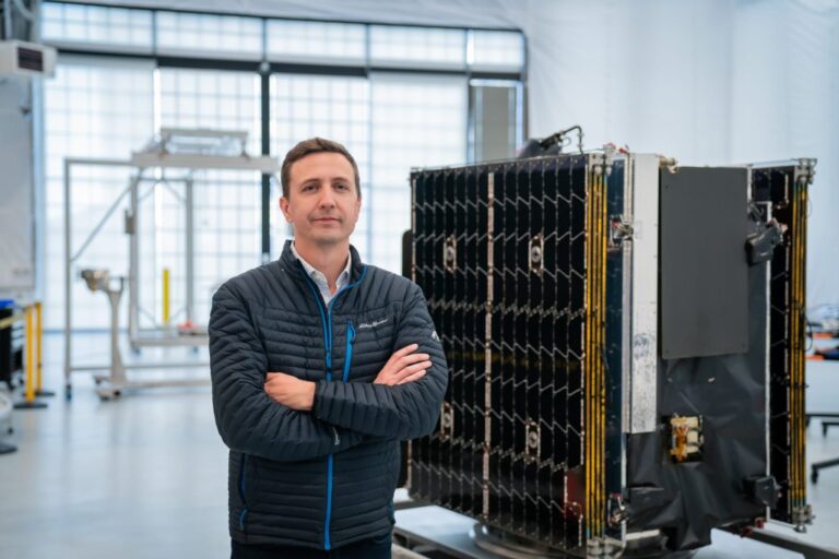 CEO-John-Gedmark-with-Alaska-Satellite-1-scaled.jpg