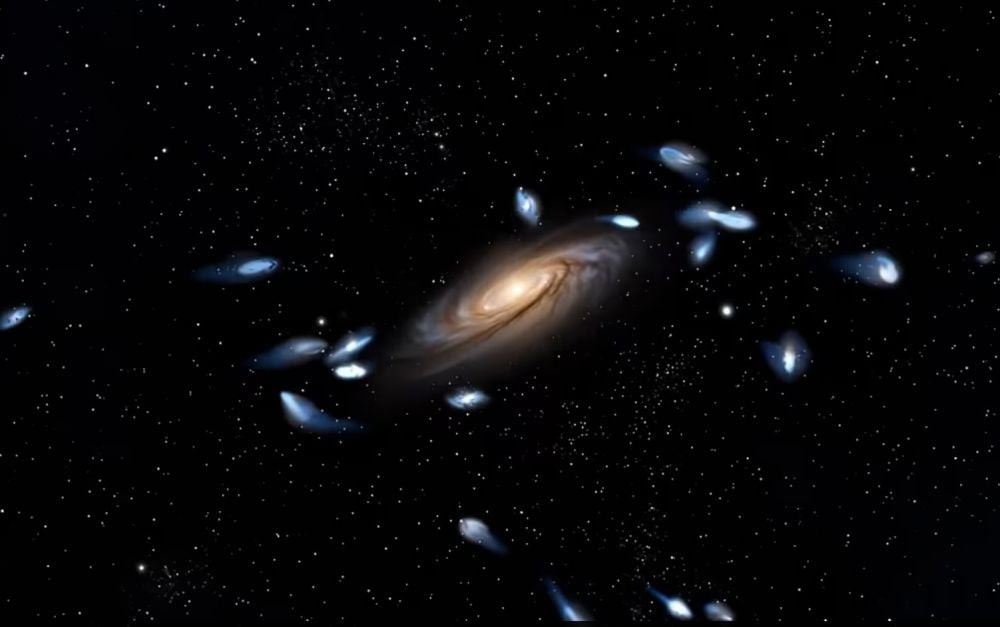 The Milky Way - Andromeda merger could occur in the next few billion years. But what will it look like? Will the pair of galaxies and their dwarfs 'dance' before merging, like other merging galaxies do? Image Credit: University of Queensland.