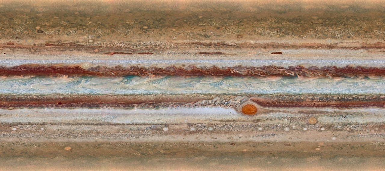 This false colour image of the atmosphere of Jupiter was captured by the Hubble Space Telescope (Credit : NASA/ESAA)