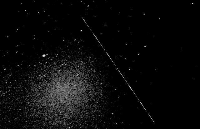 Image of the American Cosmic Background Explorer (COBE) satellite tumbling in 1992. Credit - Satobs.org