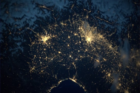 Image of northern Italy at night, representing the type of light pattern we could potentially see on an exoplanet. Credit - NASA / ESA