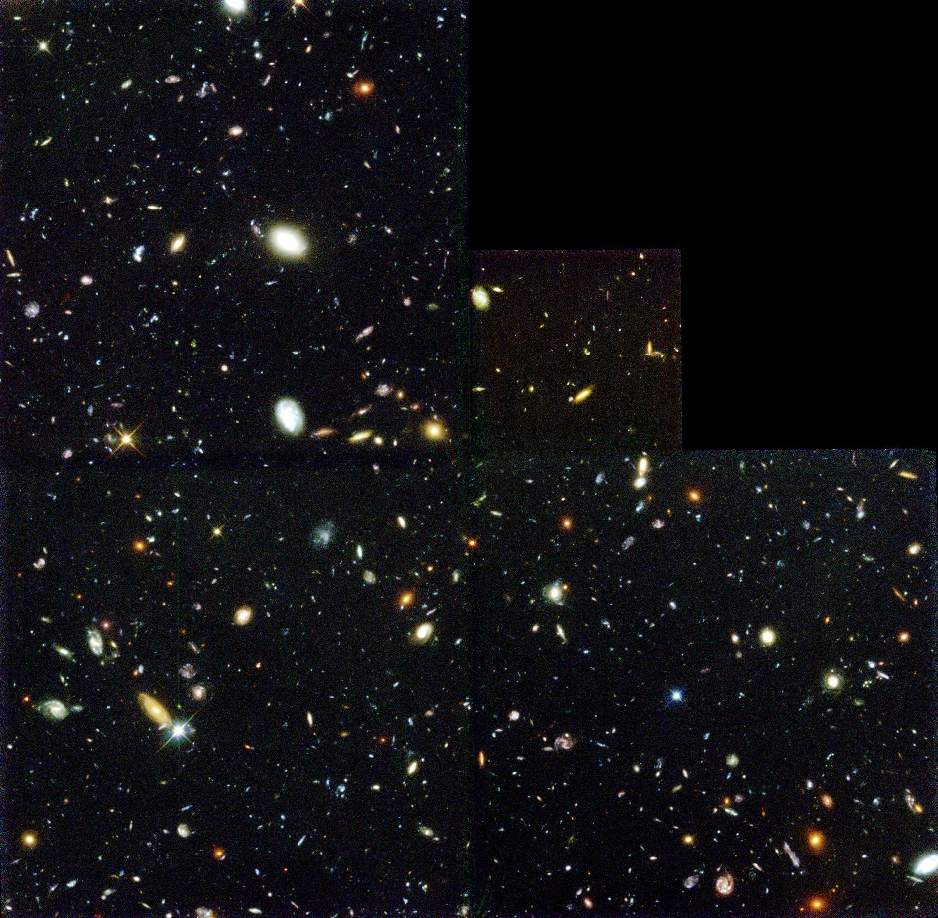 The Hubble Deep Field. Each smudge of light a galaxy containing billions of stars. Measuring how fast the universe is expanding has become one of astronomy's greatest unsolved arguments (Credit : NASA/ESA/STSci)