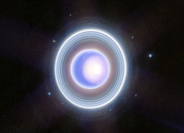 Image of Uranus taken by NASA's James Webb Space Telescope's Near-Infrared Camera (NIRCam). Along with the rings, this image also shows nine of Uranus' 27 moons. (Credit: NASA, ESA, CSA, STScI)