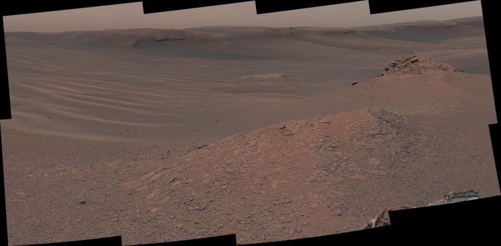 Curiosity’s Mastcam captured this mosaic on Feb. 3, 2019, of a region on Mount Sharp with lots of clay-bearing rocks that formed when lakes and streams were present billions of years ago. The “Mary Anning 3” sample was found in this clay-enriched region. The rover's SAM analysis showed that Mars is capable of preserving ancient biosignatures. Image Credit: NASA/JPL-Caltech/MSSS