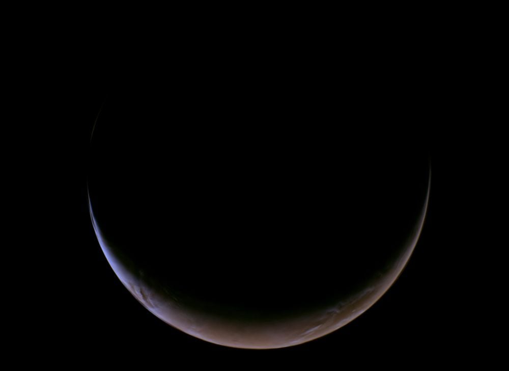 NASA's Psyche captured this false colour image of Mars during its recent flyby of the planet on May 15th. The spacecraft captured this image with its multispectral imager. The flyby was a trial run for its encounter with the asteroid Psyche, and was also a gravity-assist maneuver that helped send the spacecraft on its way. Image Credit: NASA/JPL-Caltech/ASU