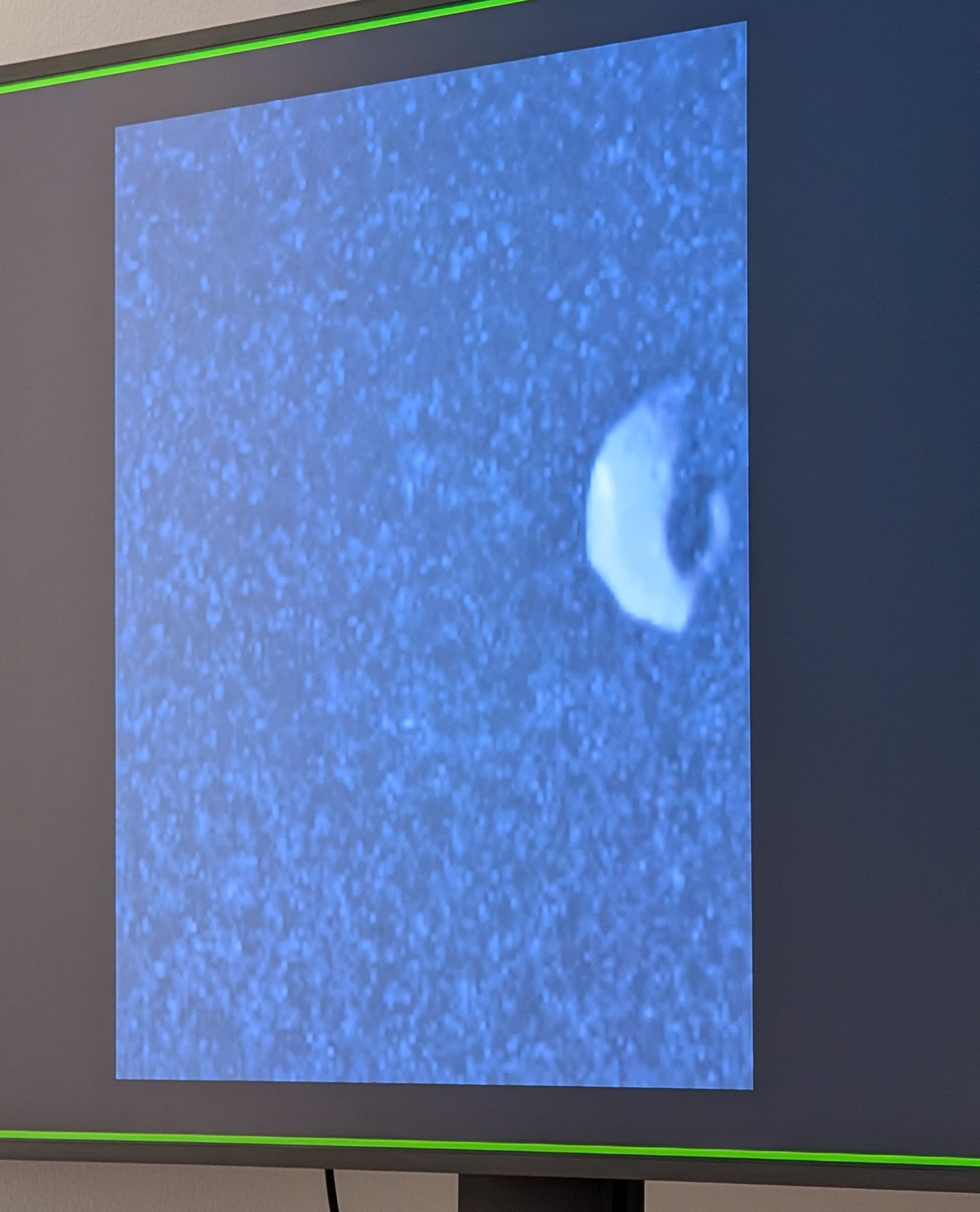 New NASA Juno image of Jupiter's tiny moon of Thebe presented at the EGU26 general assembly early this month. Credit: NASA via Bruce Dorminey