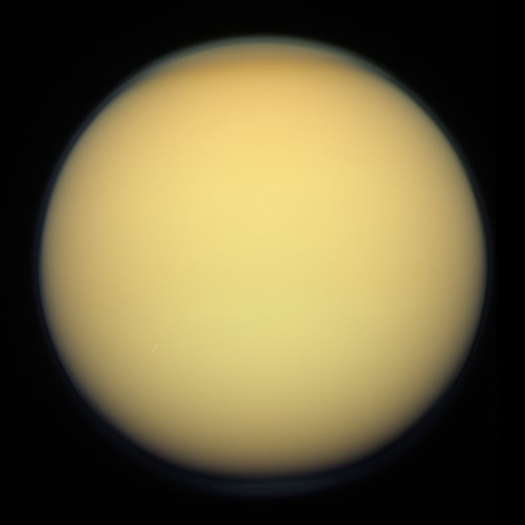 Titan, imaged by the Cassini orbiter, December 2011. A thick shroud of organic haze permanently obscures Titan's surface from viewing in visible light (Credit : NASA/JPL-Caltech/SSI/Kevin M. Gill)