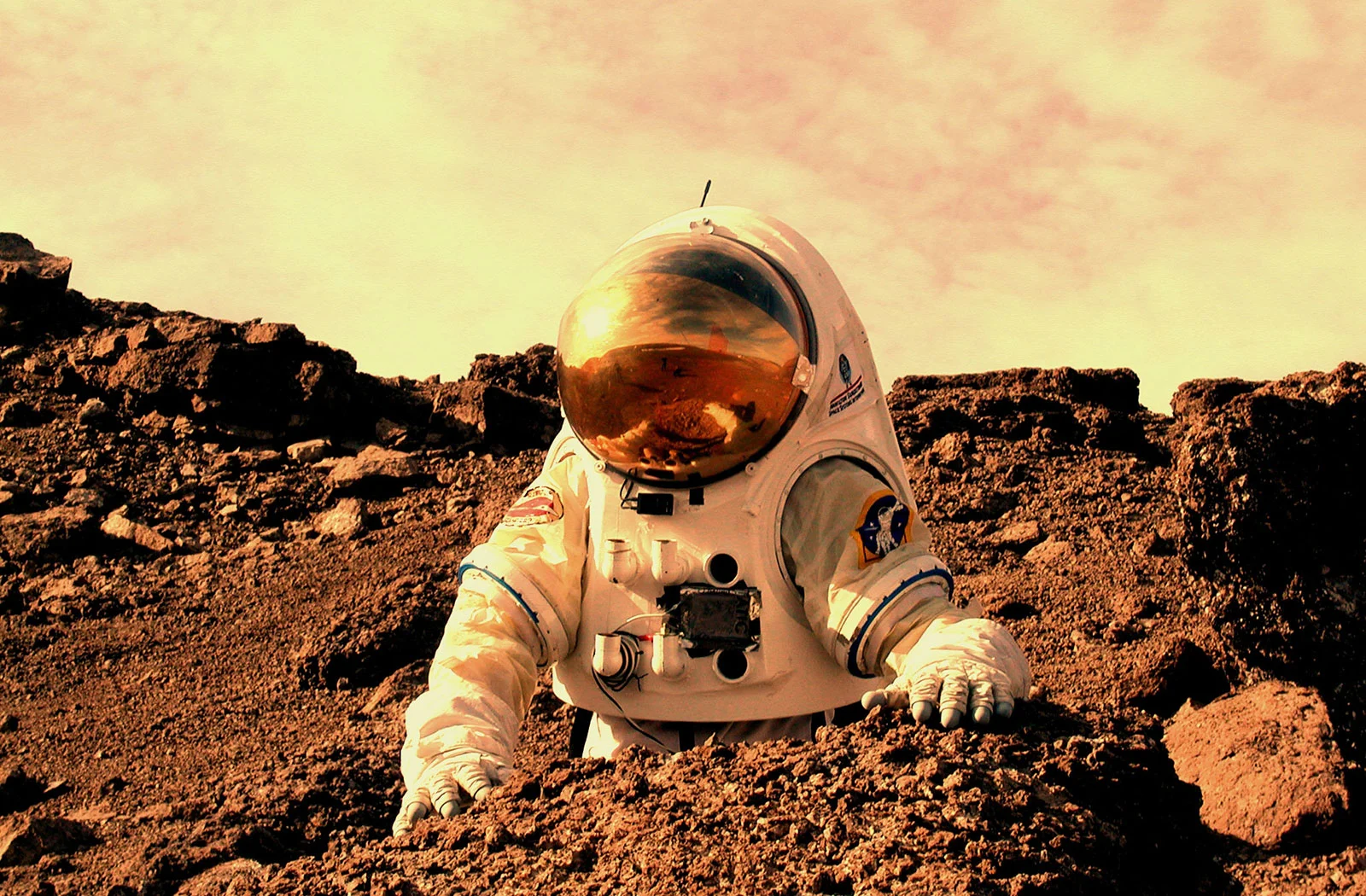 Artist's concept of an astronaut working on Mars. Credit - NASA