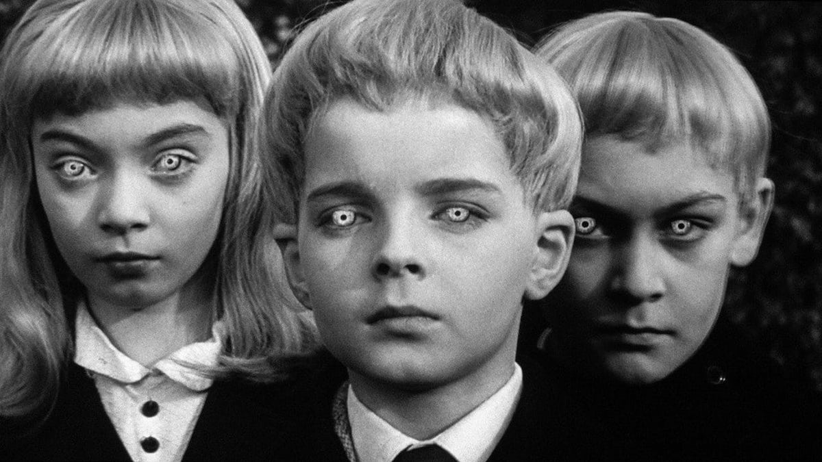Three creepy children with alien eyes in Village of the Damned