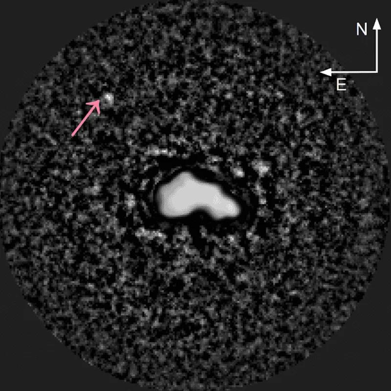 Asteroid (44) Nysa imaged with the SHARK-VIS instrument on the Large Binocular Telescope. The tiny moon S/2026 (44) 1, arrowed, was pulled from the asteroid's glare using techniques borrowed from exoplanet hunting (Credit : SHARK-VIS/LBT Observatory)
