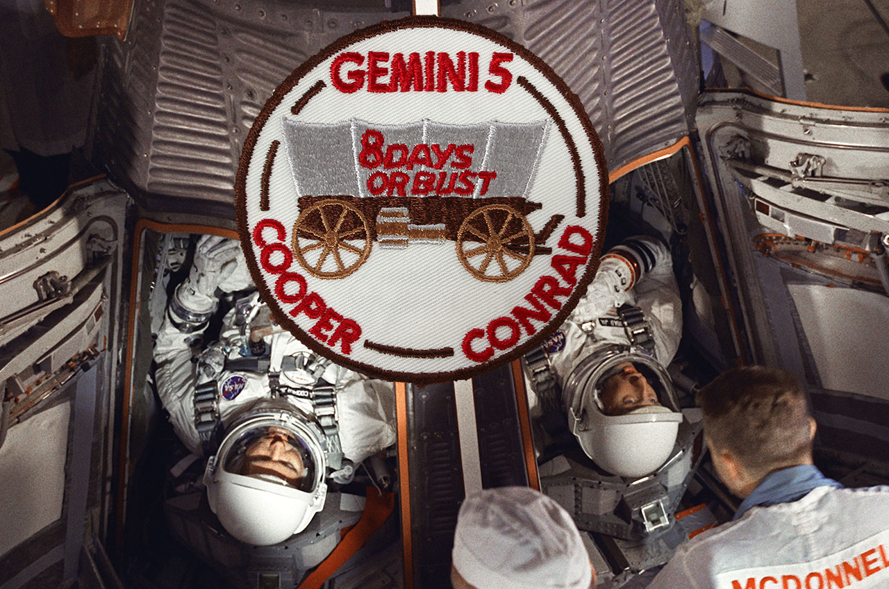 Astronauts Gordon Cooper (left) and Charles Conrad are seen in the Gemini 5 spacecraft just before launching on their 8 Days or Bust mission in 1965.