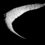 a crescent-shaped rim of a lunar crater