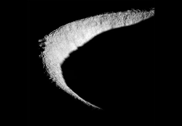 a crescent-shaped rim of a lunar crater