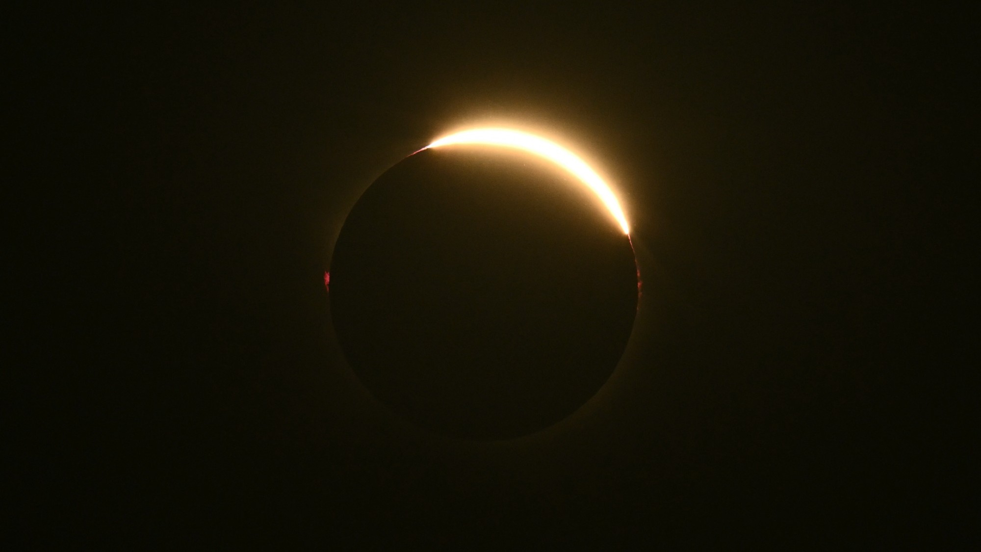 a bright ring of light on a black background