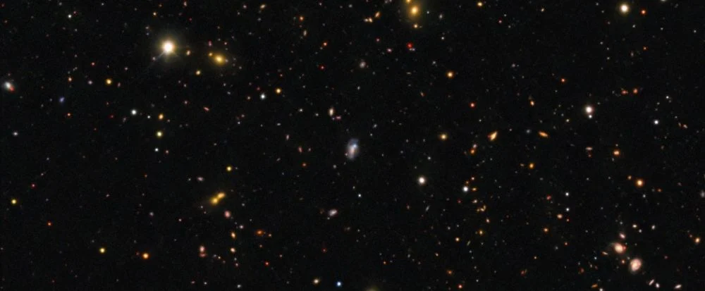 This image shows the field around supernova SN 2026gzf, detected via an X-ray flash captured by the Einstein Probe on 21 March 2026. The supernova appears as a bright blue dot within the galaxy at the center of the image. The image was captured with the 570-megapixel Dark Energy Camera (DECam), mounted on the NSF Víctor M. Blanco 4-meter Telescope at Cerro Tololo Inter-American Observatory (CTIO) in Chile. Image Credit: CTIO/NOIRLab/DOE/NSF/AURA