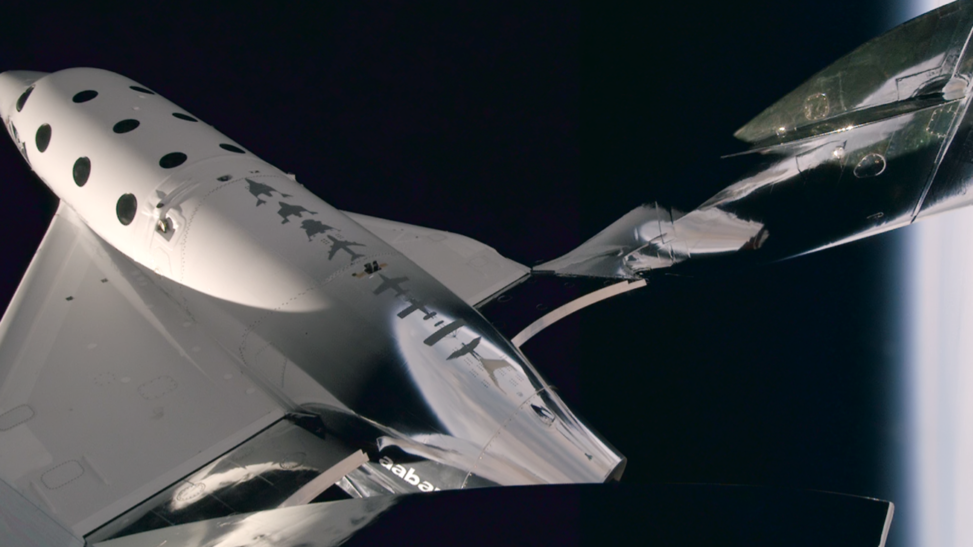 a white space plane soars high above earth