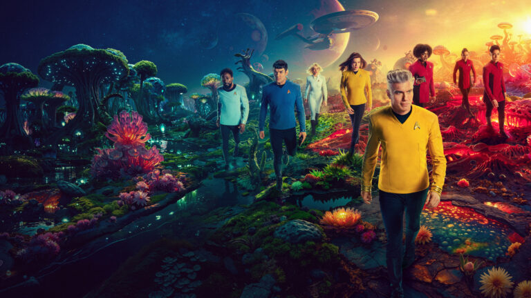starship crew members in colorful uniforms walking across an alien world