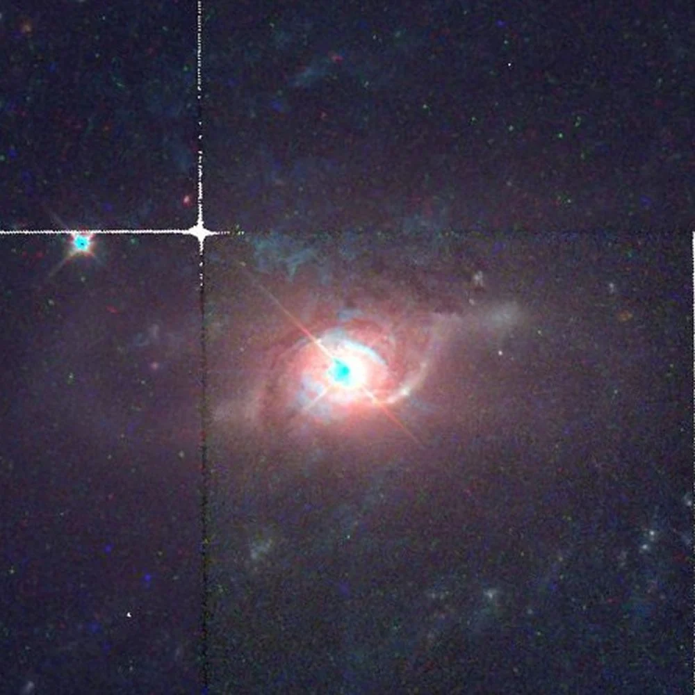 A Hubble image of 3C 120, an active galaxy with a rapidly-accreting SMBH that's launching jets. The researchers examined it with state of the art x-ray and radio observatories. Image Credit: By HST and C messier - Public Domain, https://commons.wikimedia.org/w/index.php?curid=133791754