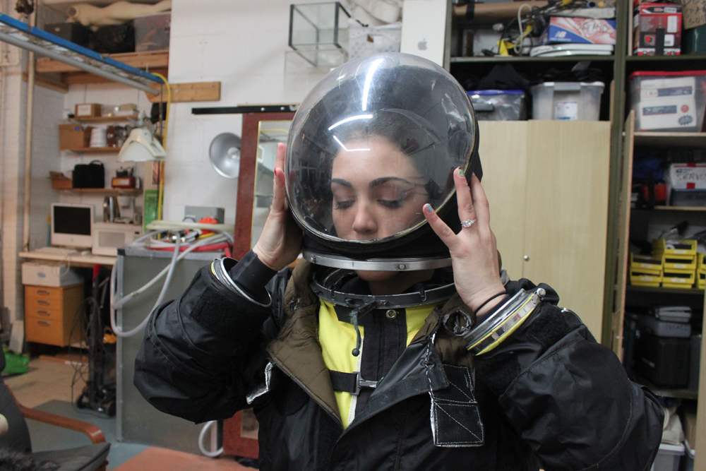 MDRS Crew 149 member Kellie Gerardi tries on her EVA suit.