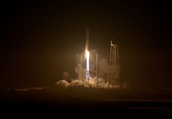An upgraded Orbital ATK Antares rocket soars into the night sky over NASA's Wallops Flight Facility on Wallops Island, Virginia on Oct. 17, 2016.