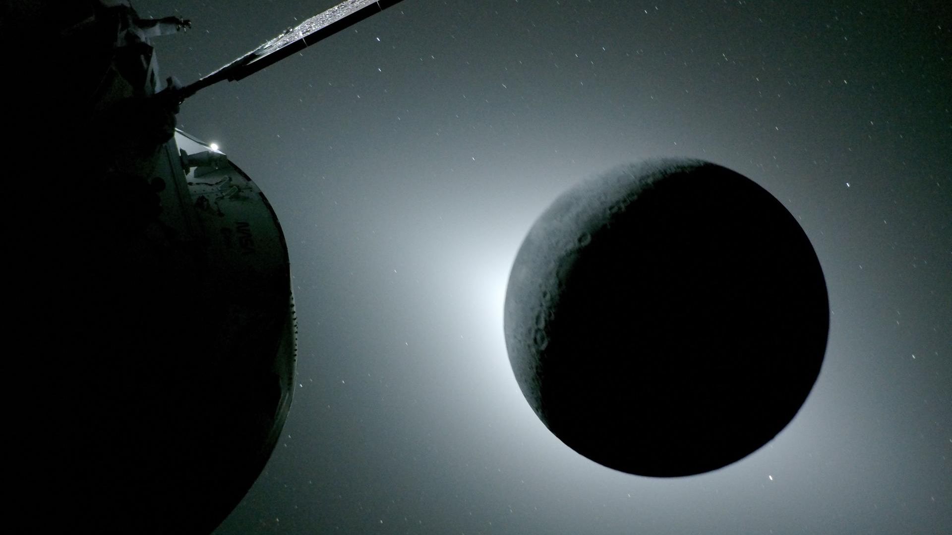 the moon eclipses the sun as viewed from the far side by the orion spacecraft.