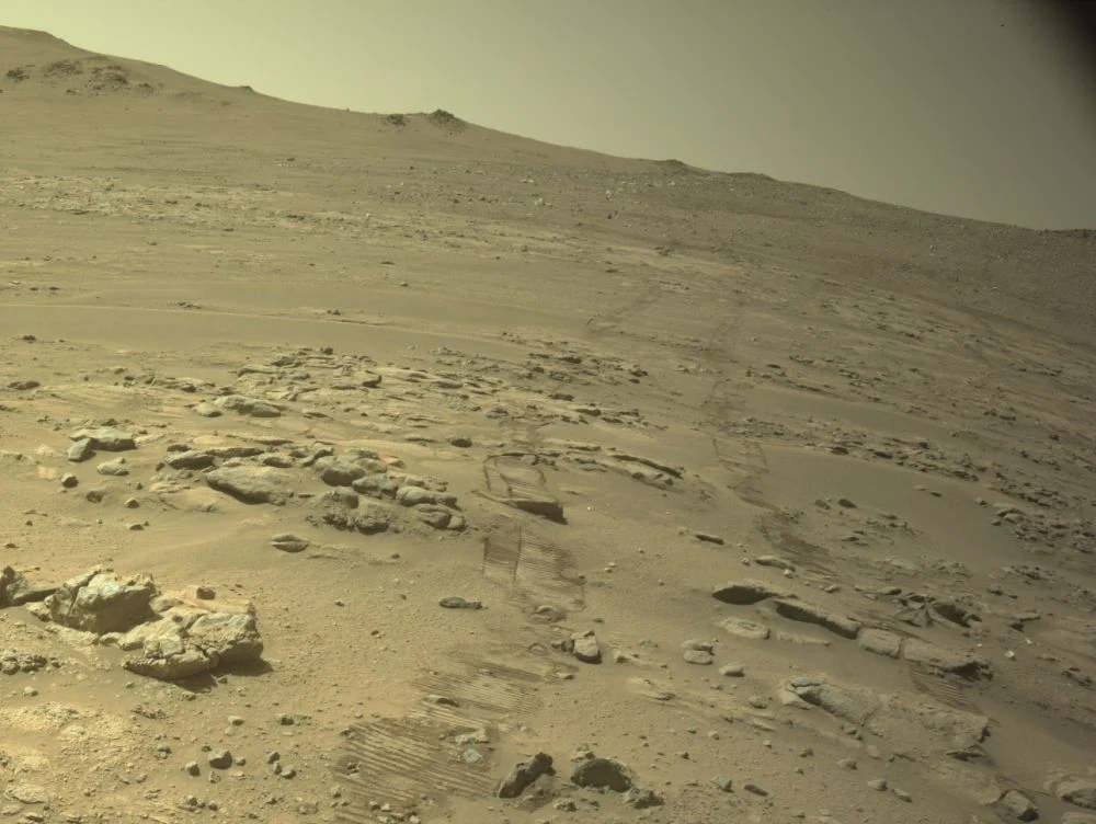 Perseverance captured this backward-looking image on the day it set its new distance-travelled record. The date was Oct. 11th 2026, or on the 2006th Martian sol of its mission. Image Credit: NASA/JPL-Caltech