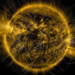 This is a depiction of the Sun’s magnetic fields overlaid on an image of the Sun captured in extreme ultraviolet light by NASA’s Solar Dynamics Observatory on March 12, 2016. The churning, rotating fields eventually break, and then reconnect to the Sun in a more stable and straightforward configuration, releasing flares. Image Credit: NASA/SDO/AIA/LMSAL