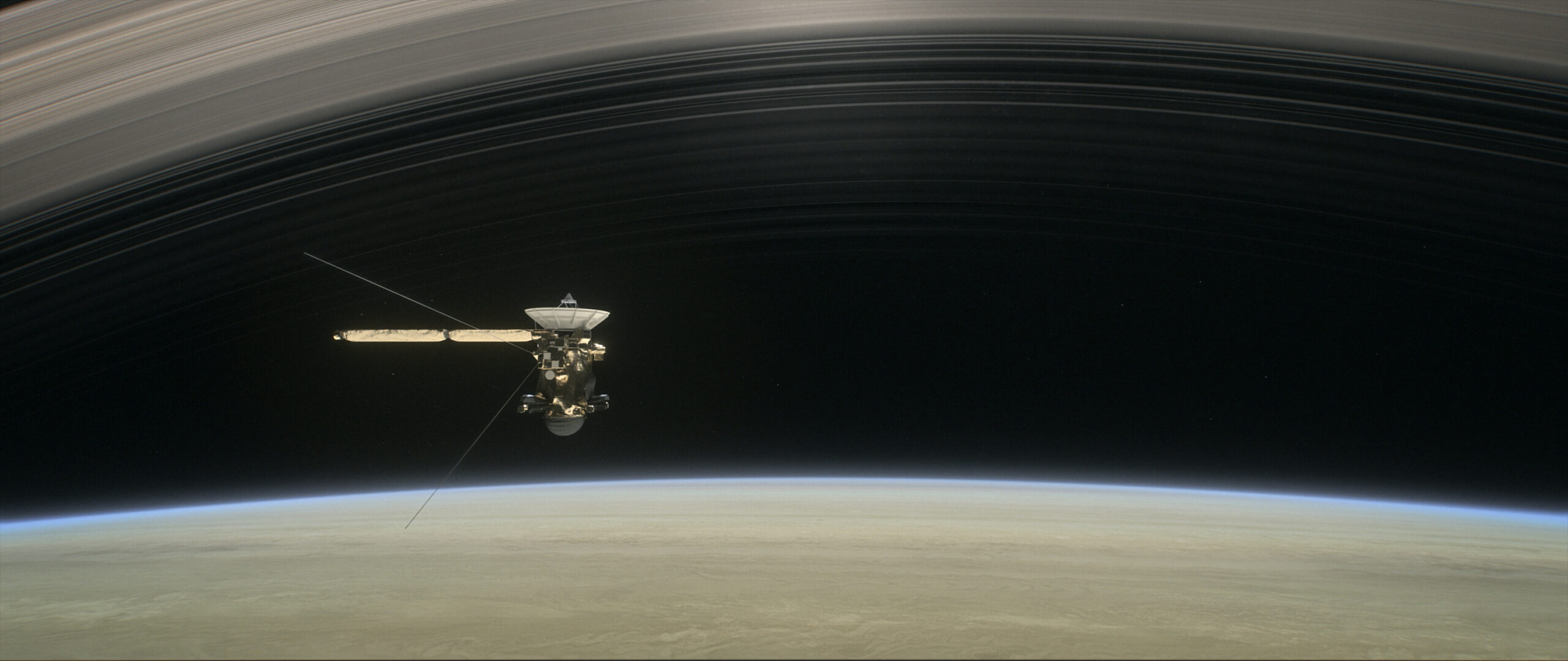 This artist's illustration shows Cassini making one of its final five dives through Saturn's upper atmosphere in August and September 2017.